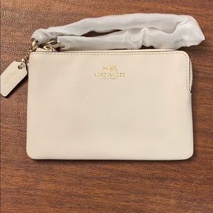 NWT: Coach leather wristlet-cream